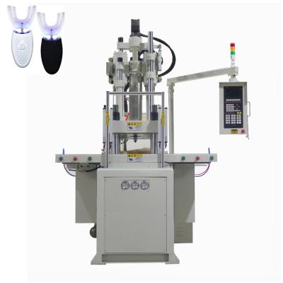 China 85 Ton Double Slide Vertical Injection Molding Machine For Making Dental Beauty Device for sale