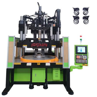 China 120 Ton Low Work Table Vertical Injection Molding Machine For Making Luggage Wheels en venta