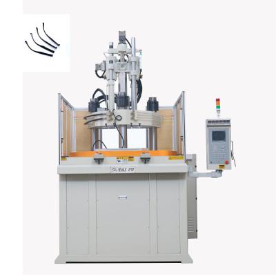 China 120 Ton Rotary Vertical Plastic Injection Molding Machine For Making Glasses Frame à venda