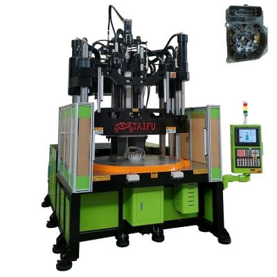 China Low Work Table Vertical Injection Molding Machine For Making ABS Control Module en venta