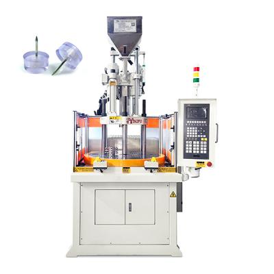 Chine Machine de moulage par injection de plastique rotatif verticale à haut rendement pour la fabrication de taches à vendre