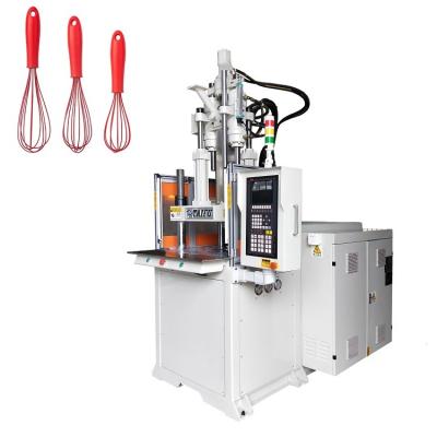 Cina 85 tonnellate Vertical Plastic Product Injection Molding Machine per la fabbricazione di battitore per uova in vendita