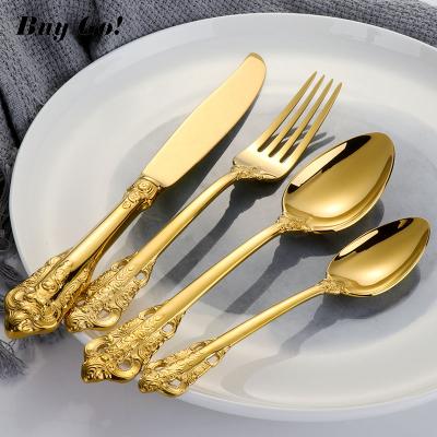 China Amazon Palace Success Viable Tableware Set Noble Classic Rose Gold Stainless Steel Relief Cutlery Set for sale