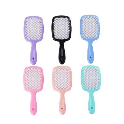 China New Home Hairdressing Tool Salon DIY Wide Teeth Air Cushion Comb Women Hollowing Out Scalp Massage Comb for sale