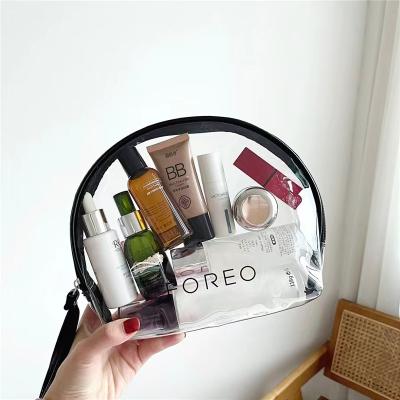 China Large Capacity Single Portable Skin Care Products Travel PVC Leather Handled Cosmetic Bag for sale