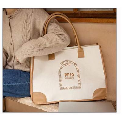 China Exhibition the latest fashion alphabet printing large grocery store giant shoulder graffiti canvas bag for sale