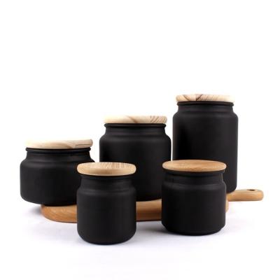 China Luxury Painted 3.5oz Container 5oz 10oz 17oz 24oz Matte Glass Candle Jar Black Frosted Empty Candle Jar With Bamboo Wood Lid for sale