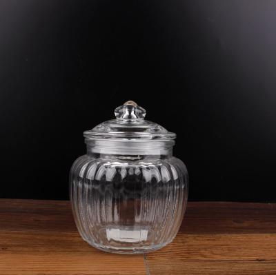 China Freshness Preservation Vertical Grain 1200ml Round Shape Glass Airtight Jar For Home Daily Use Glass Jar For Pasta for sale