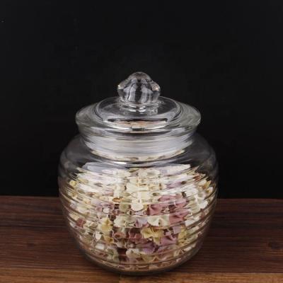 China Freshness Preservation 1300ml Round Glass Storage Jar With Stopper Lid for sale