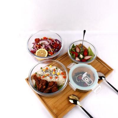 China Sustainable Small Round Heat Resistant Glass Food Container With Valve for sale