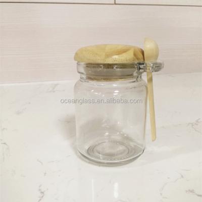 China Viable Glass Bath Salt Jar With Wooden Spoon And Cork 8oz, 220ML Glass Jar For Sugar With Spoon for sale