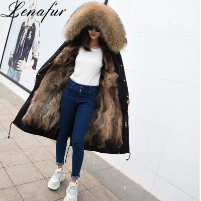 China 30 Colors Anti-Shrink Winter Medium Long Raccoon Fur Real Trimmed Hooded Fur Parka Coat For Women for sale