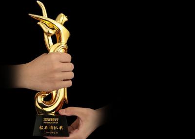 China Poly Resin Material Award Cups Trophies With Abstract Figure Design for sale