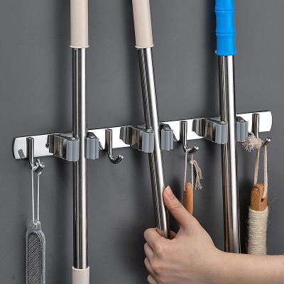 China Rust Prevention 304 Stainless Steel Wall Mount Broom Holder Corrosion Resistant and Storage Rack Hanger for sale