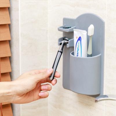 China Eco-Friendly Durable Silicone Toothbrush Holder Holder Wall Mounted Bathroom Organizer for sale