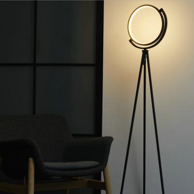 China Warm Minimalist Modern Living Room Bedroom Round Shape Decorative Lighting Standing Tripod Halo Minimalist Floor Lamp Led Home Decor for sale