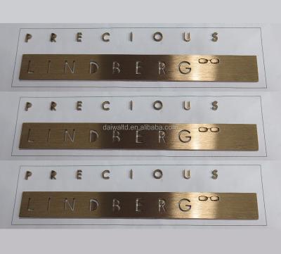 China Stainless steel /opal acrylic/LED laser cut mounted solid gold stainless steel letters case on display for sale