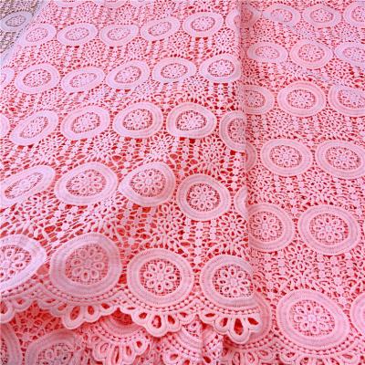 China Low MOQ 100% guipure lace fabric from factory water soluble milk silk lace fabric pink floral bridal lace fabric for dressing for sale