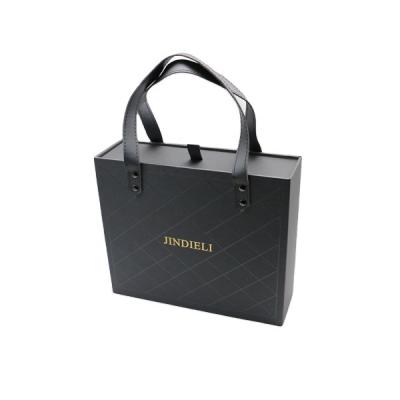 China Promotion Flowers Cardboard Perfume Handbag With Handle Luxury Style For Perfume Bottle Packaging Two for sale