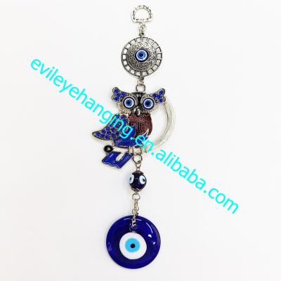 China Fashion Metal Antique Imitation Colorful Owls Blue Evil Eye Wall Hanging Decoration For Souvenir And Amulet Gift for sale