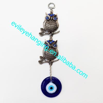 China Evil eye; Traditional Metal Owl Blue Evil Eye Wall Hanging Decoration for Souvenir and Amulet Gift for sale