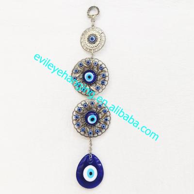 China Evil eye; Traditional Blue Evil Eye Amulet Carving Pattern Wall Hanging Decoration For Metal Crafts Souvenir And Gift for sale