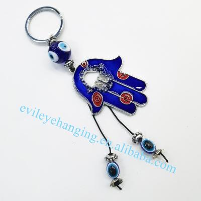 China Fatima Hamsa Backpack Pendants Palm Drop Oil Key Chain Evil Eye Hanging Hand for sale