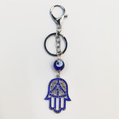 China Eco-Friendly Fashion Evil Eye Hand Crystal Keychain Fatima Hamsa Keychain Backpack Pendants or Phone Pendants for sale