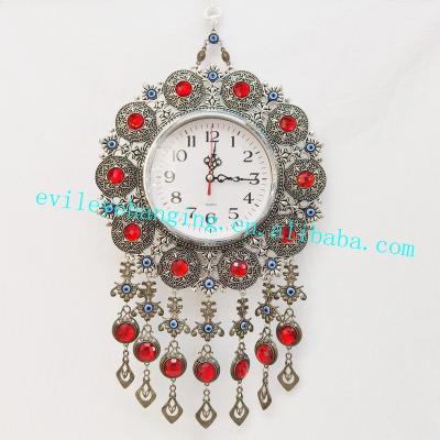 China Traditional Large Size Antique Clock Wall Hanging Decoration With Evil Eye Bead Metal Handcrafted Glass Crafts for sale