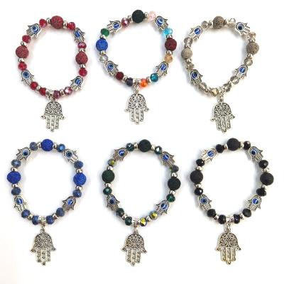 China Wholesale Antique Imitation Evil Eye Many Kinds Of Colors Blue Eye Hand Of Fatima Hamsa Hand With Evil Eye Lava Stone And Alloy Bracelet for sale