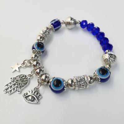 China Durable Blue Eye Fatima Hamsa Hand With Evil Eye Resin Alloy Star Beaded Bracelet (Accept Custom Design) for sale