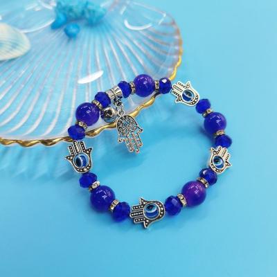 China Fatima Hamsa Hand Daily Life Blue Eye Hand With Evil Eye Crystal Stone Beads Alloy Mascot Bracelet for sale