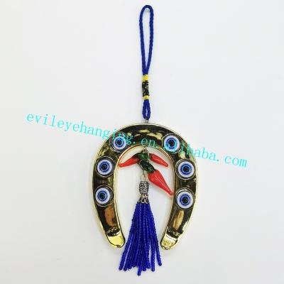 China Europe Width7.5cm: Chili Blue Evil Eye Horseshoe Wall Hanging Decoration with Resin Souvenir and Gift (Customizable Color) for sale