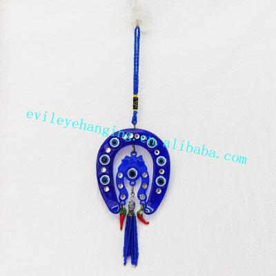 China Europe Double Horseshoe and Chili Blue Evil Eye Wall Hanging Decoration with Resin Souvenir and Gift (Color Customizable) for sale