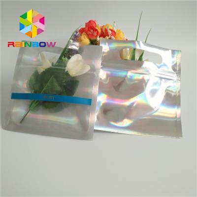 China Three Side Seal One Side Seal Clear Hologram Packaging Small Zipper Lock Mylar Hologram Moisture Proof Bags for sale