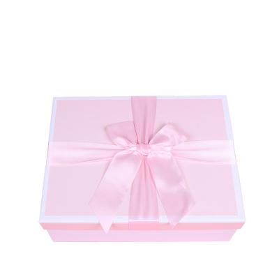 China Recyclable Top And Bottom Bowknot Gift Box Cover Custom Gift Box With Hand Gift Cosmetics Box Custom LOGO for sale