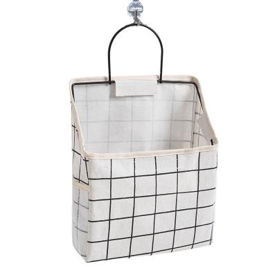 China High Quality Waterproof Hanging Storage Bag Over Door Cabinet Organizer Hanging Pocket Linen Cotton Storage Basket for sale