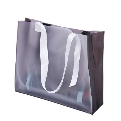 China Custom Moisture Proof Shopping Plastic Bags Bags With Logo PVC Plastic Handbag Transparent Frosted Plastic Bag for sale