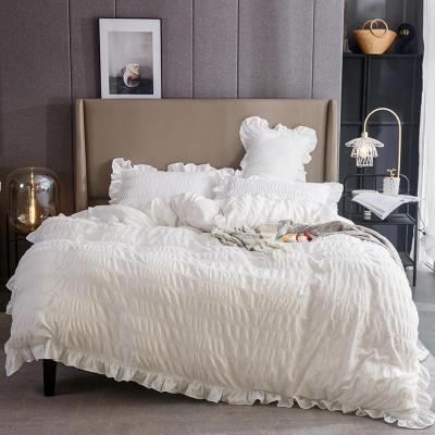 China 2021Famous brand eco-friendly bedding set cotton seersucker puff lace comforter double bed sheets wholesale for sale