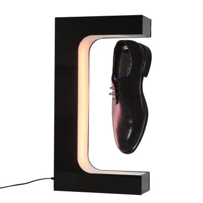 China Display Rack Holder Shelf Rotating Colorful LED Light Magnetic Levitation Shoe Display for sale