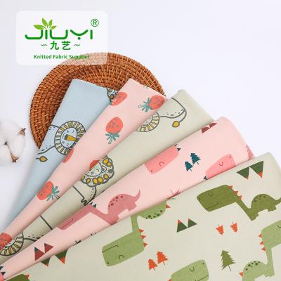 China Soft Custom Pattern Eco-friendly Organic Kids 95% Cartoon 5% Spandex Wool Cotton Interlock Fabric For Kid Clothes Bedding for sale