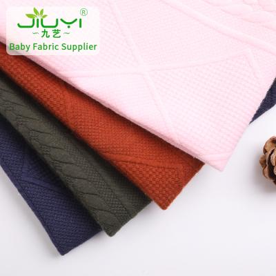 China High quality stretch dyed polyester spandex jacquard scuba knit fabric for garment for sale