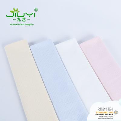 China Double Stitch Jacqurard Scuba Scuba Organic Warm Breathable 100% Cotton Fabric For Bed Sheet for sale