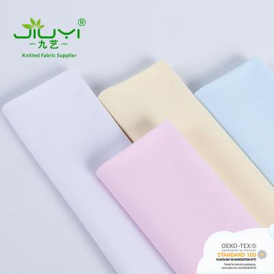 China Tear-Resistant Stock 32s Combed Smooth Texture 100% Cotton Knitted T-shirt Singlet Fabric Roll For Mask for sale