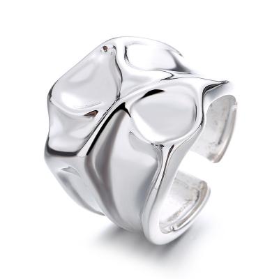 China Fashionable custom texture 925 sterling high-end irregular high-end hip-hop water wave jewelry factory punk silver ring for sale