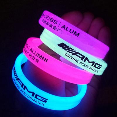 China Custom Cheapest Custom Logo Text Color Print Debossed Size Glowing In Dark Silicone Wristband for sale