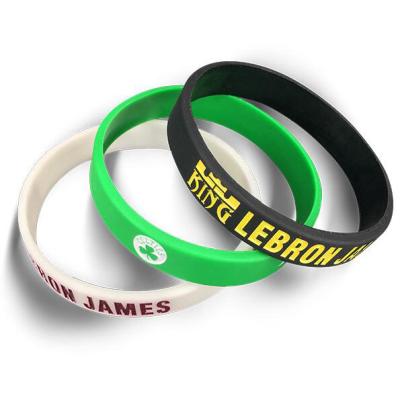 China Global Eco-Friendly Customized Debossed Glowing Silicone Wristband for sale