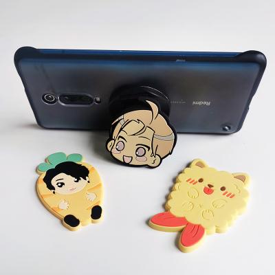 China Custom Wholesale Adjustable PVC Decorative Cute Cartoon Silicone Retractable Folding Mobile Phone Holder for sale