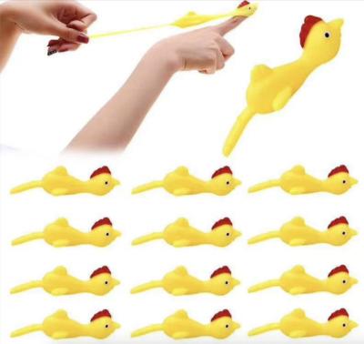 China Wall Toy Flying Rubber Finger Slingshot Decompression Ejection Chicken Stick for sale