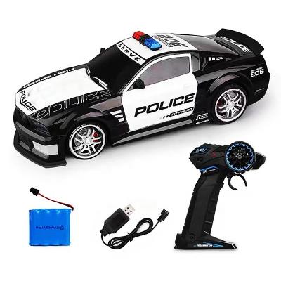 China XINGMING RC Model 1:12 High-speed Drift Car Police Car Charging Battery Operated Remote Control Toy for Kids for sale